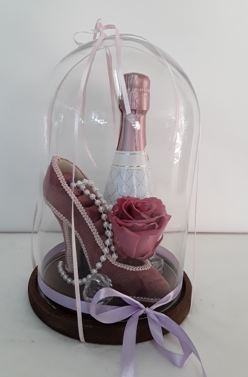 Forever rose in glass with sparkling wine