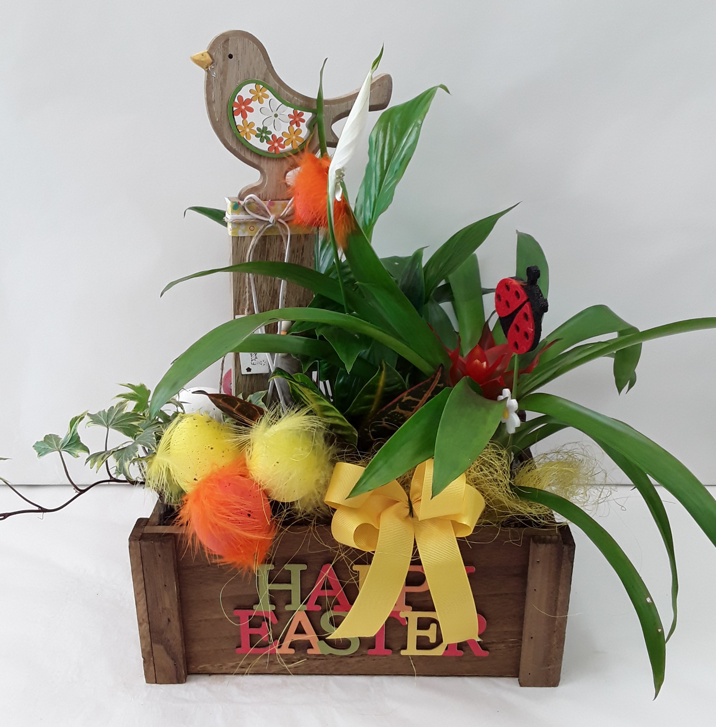 easter creation with plants in a pot