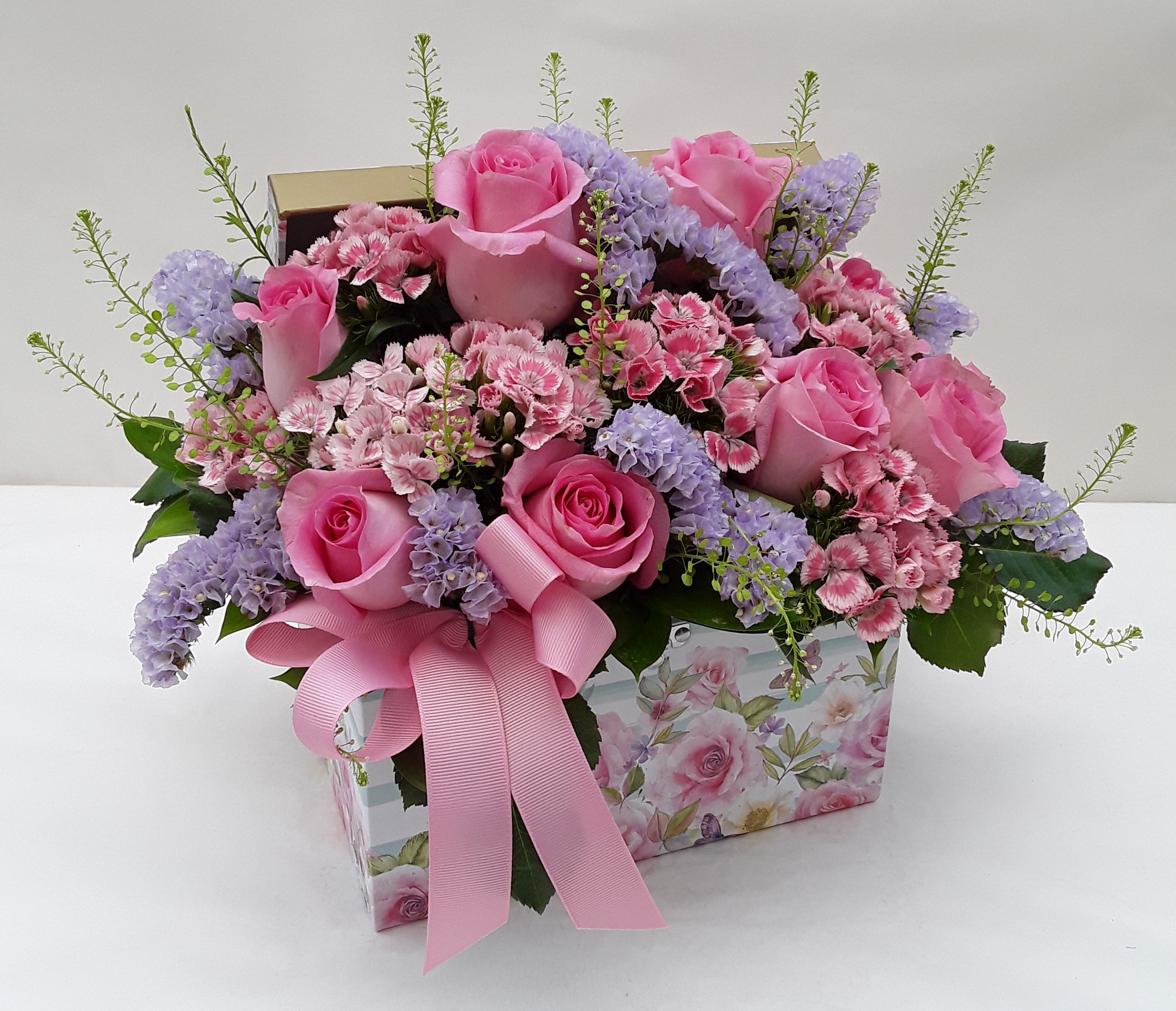 Mixed flowers in big chest