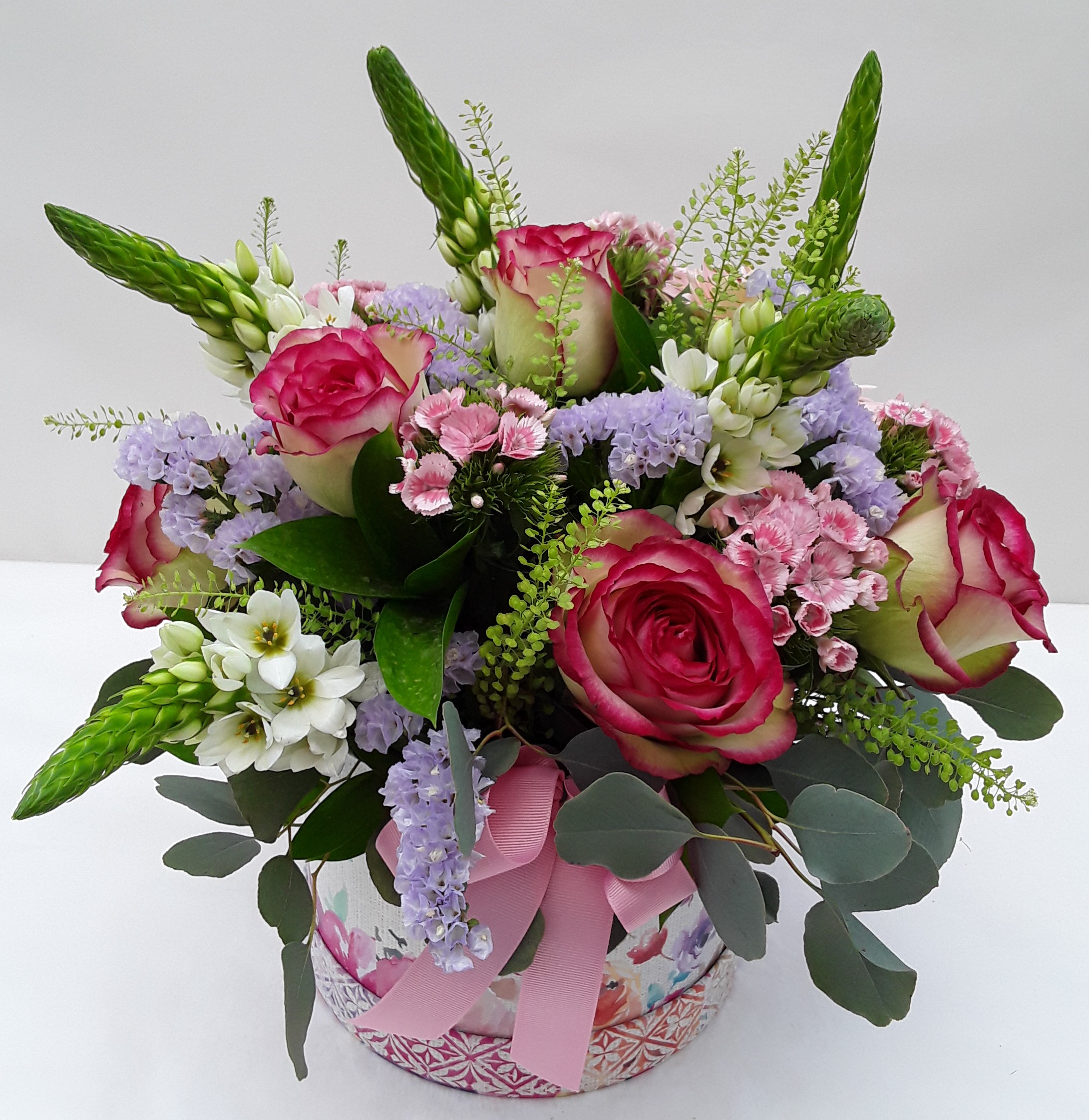 Mixed flowers in clay pot