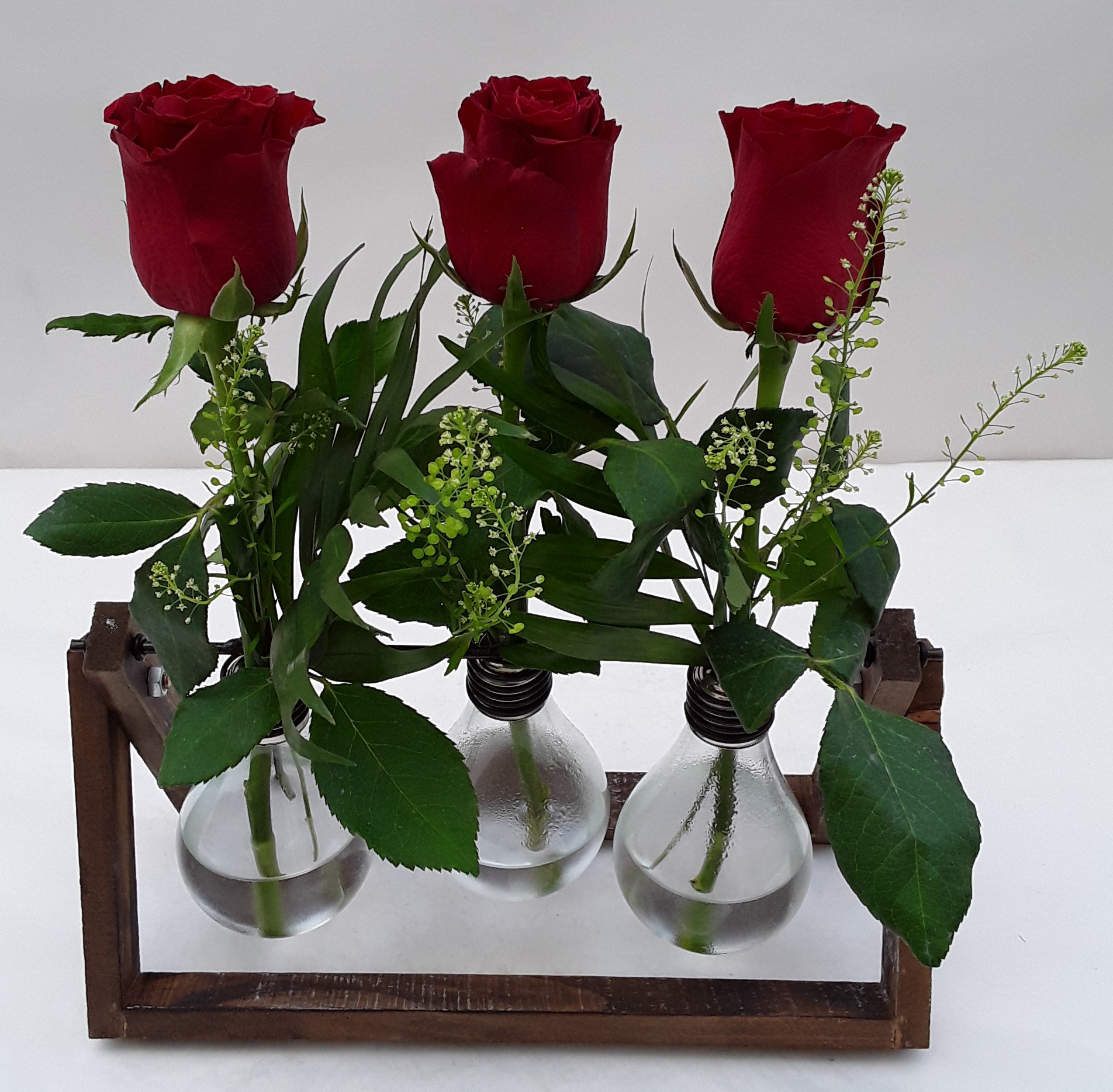 Red roses in lamps