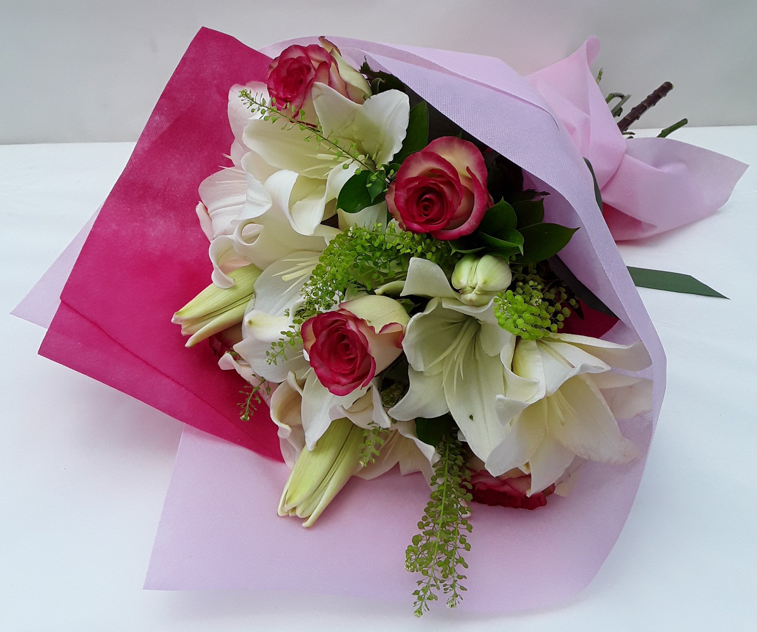 Bouquet with roses and lillies
