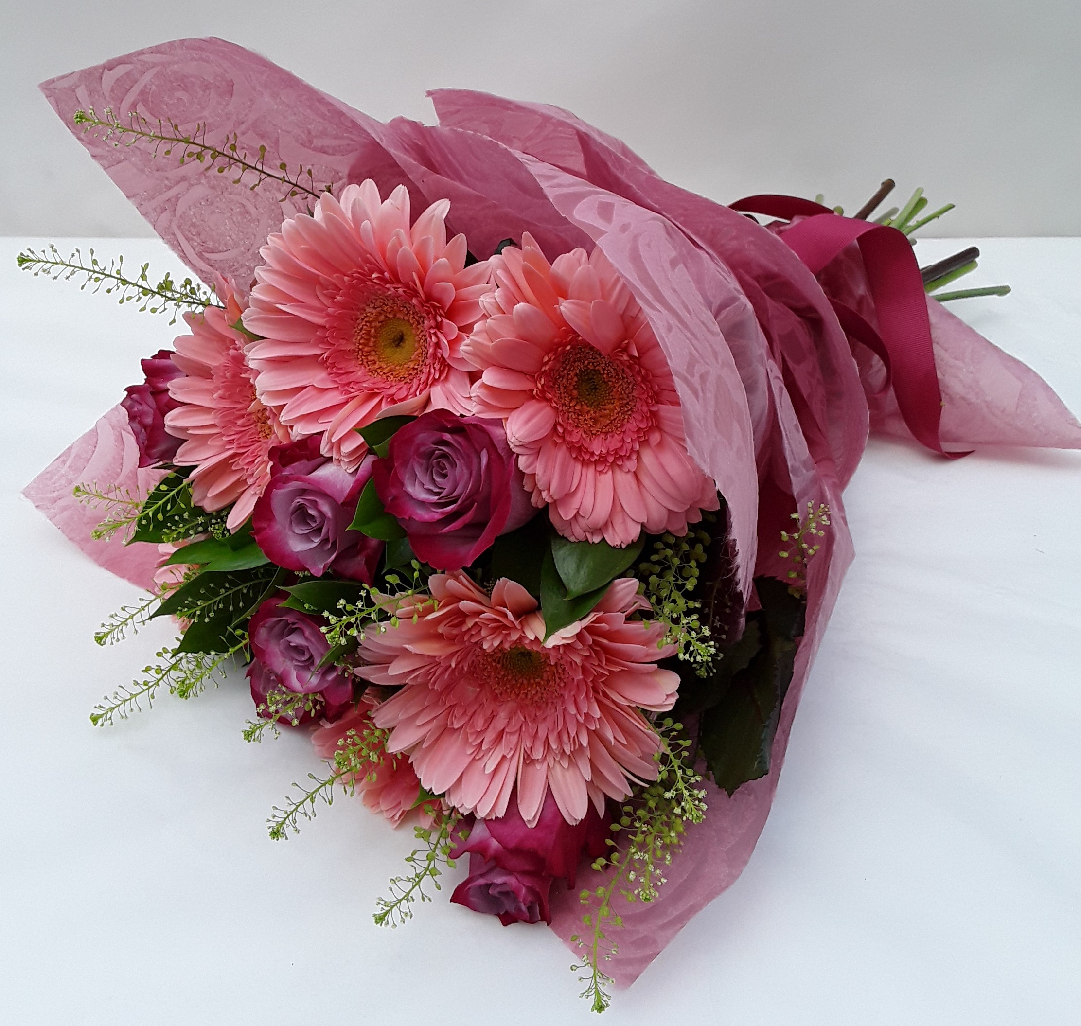 Bouquets with roses and gerberas