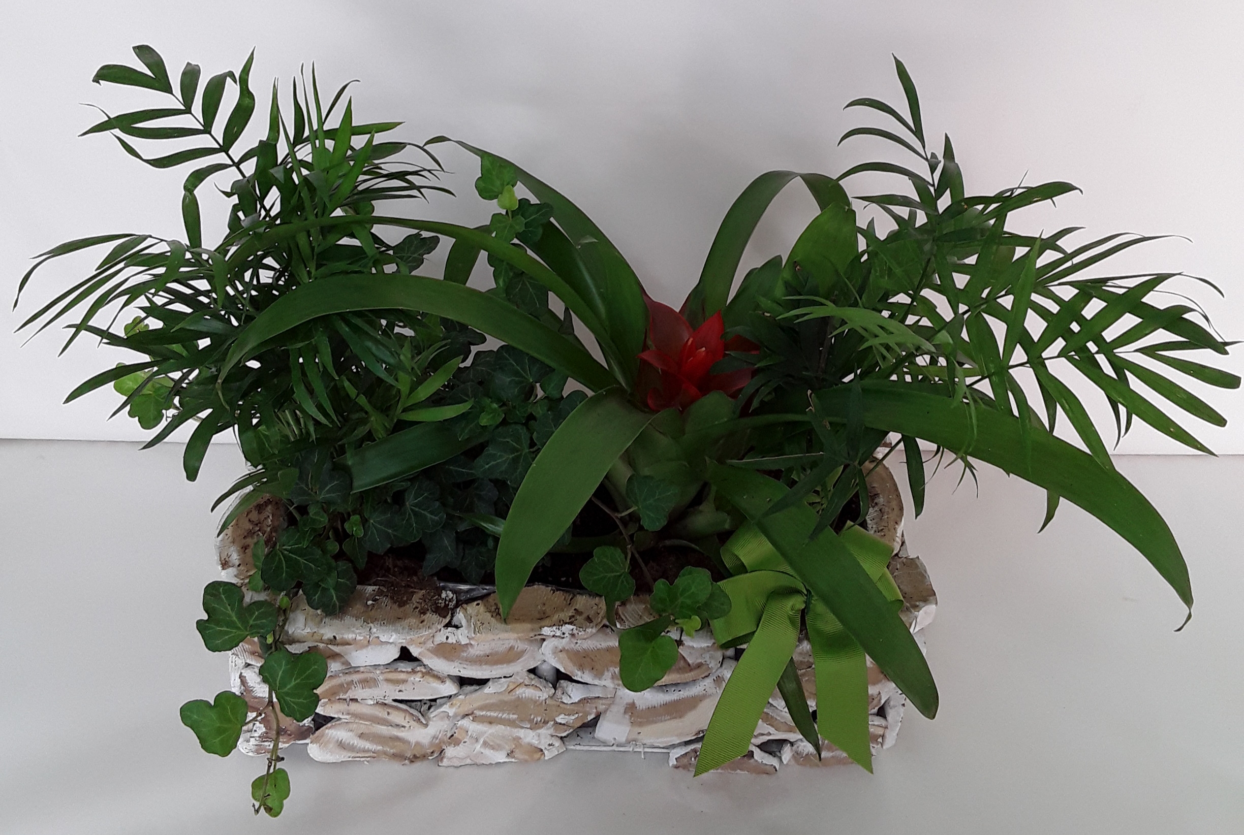 Mixed flowers in a wooden creation