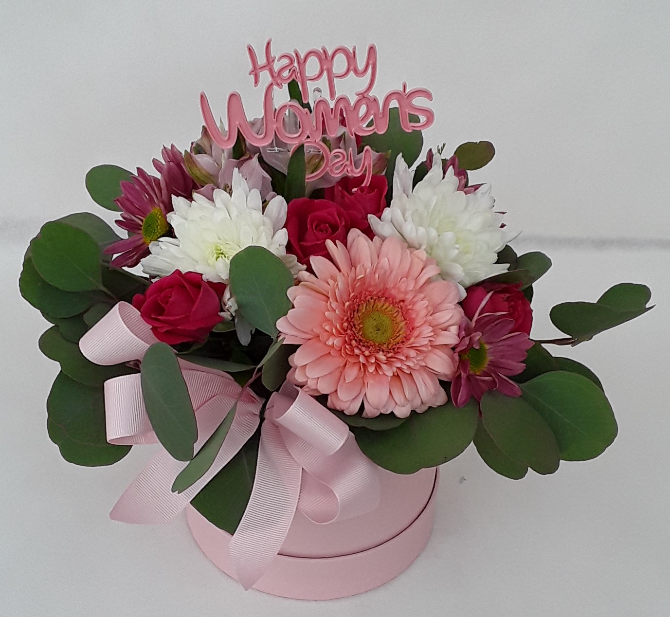 Mixed seasonal flowers in a box small