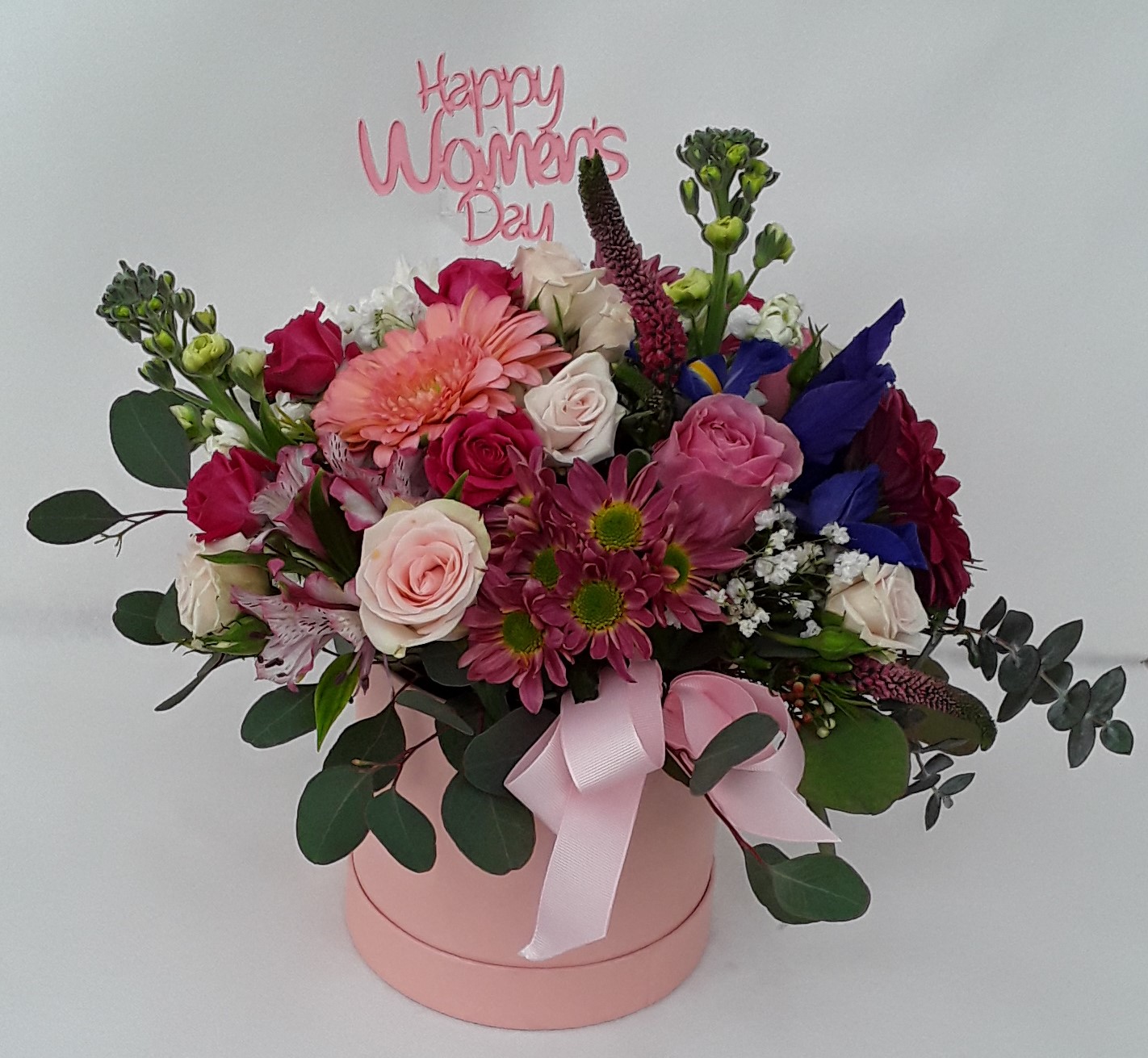 Mixed seasonal flowers in a box medium