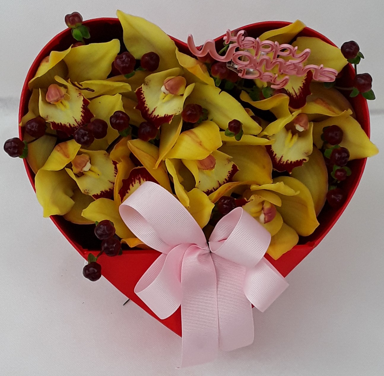 Red heart box with orchids