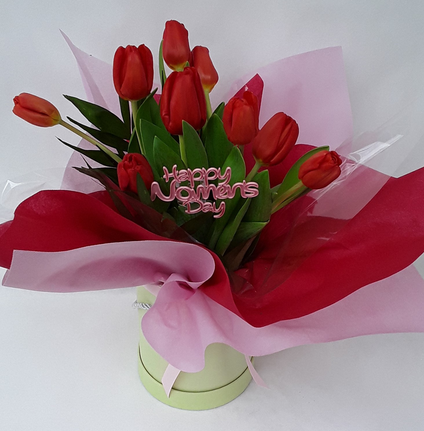 Red tulips in a box
