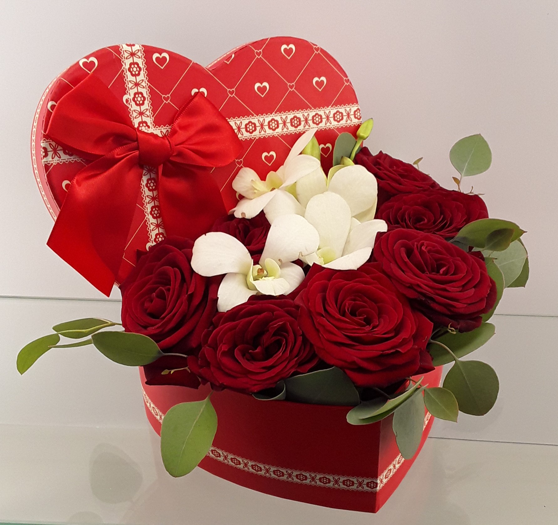 B2318- Florists 7 red roses and orchids in heart shaped Flower Box Love's Set