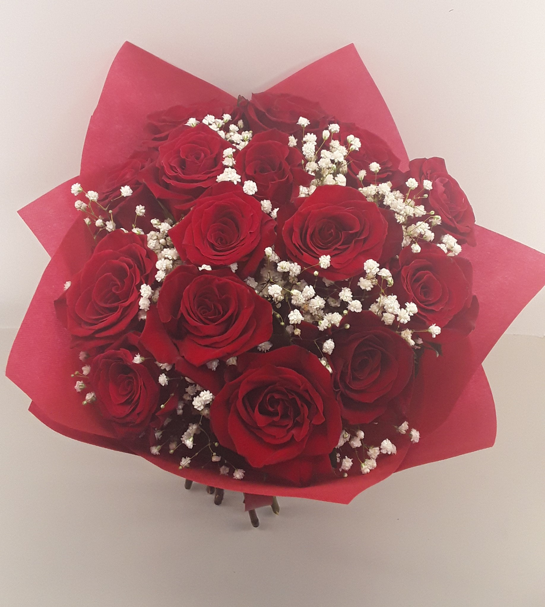 15 red roses in a bouquet