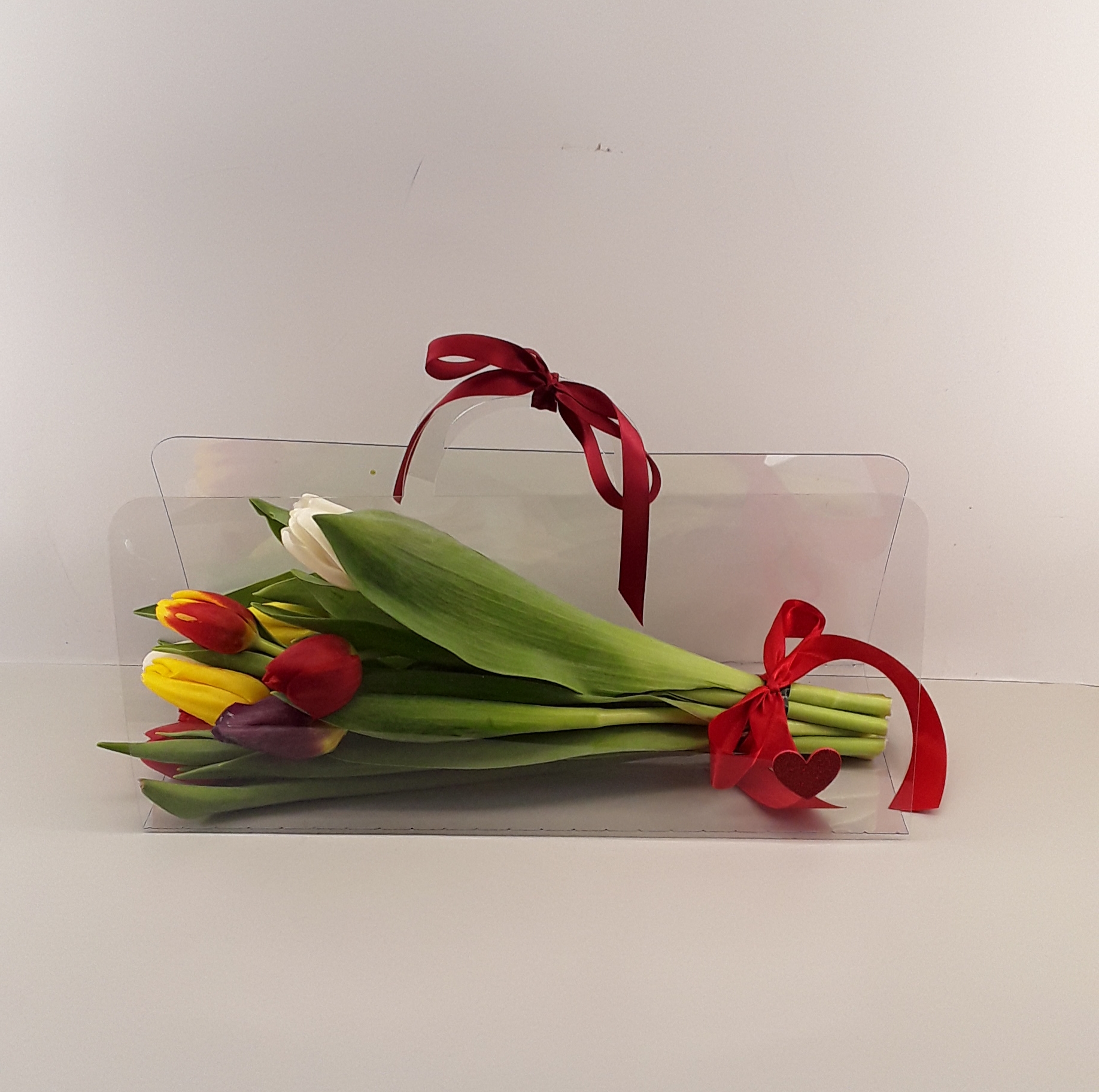 B2401--11 mixed tulips bouquet in a bag