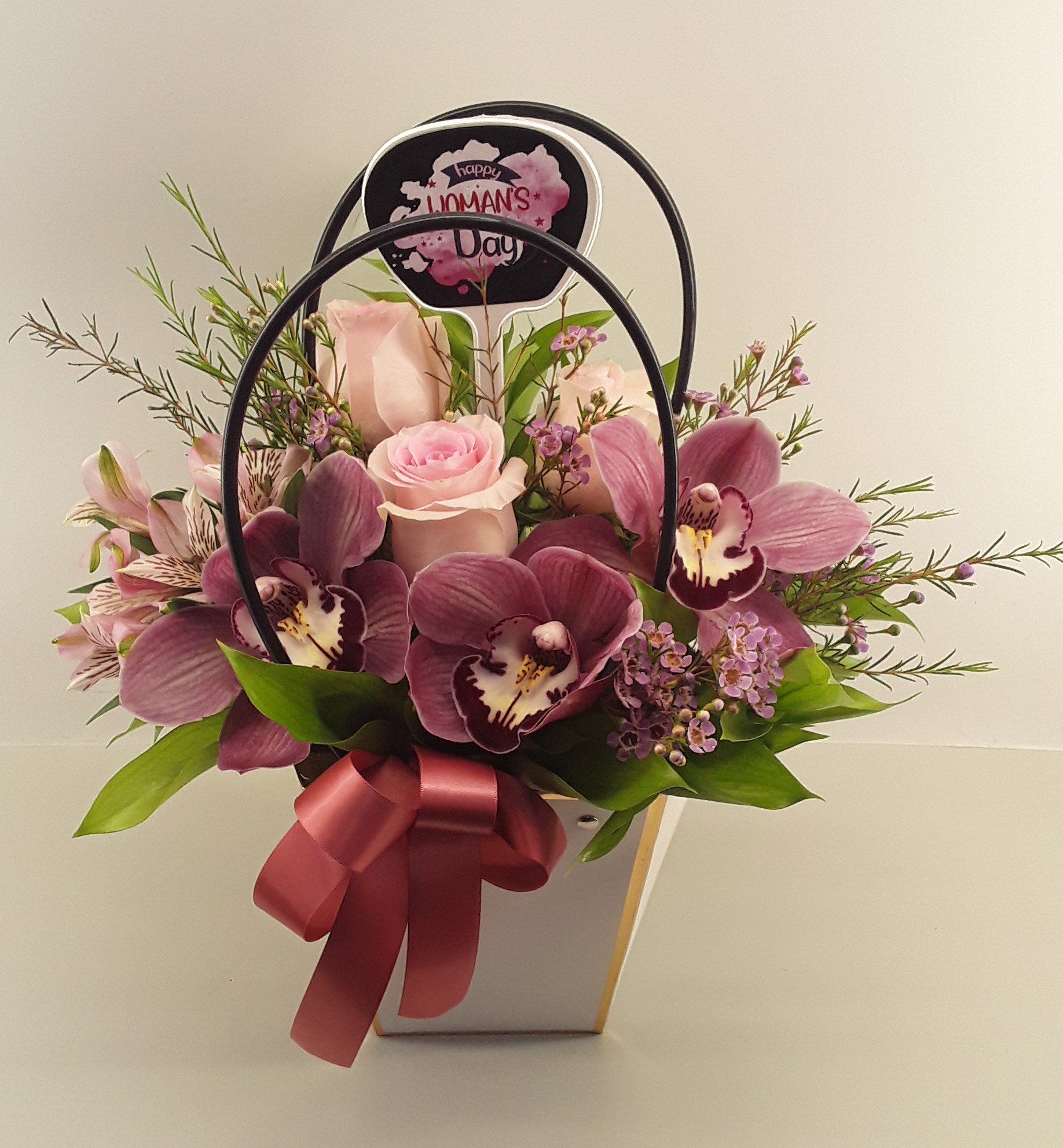 W2406--Mixed flowers in white bag