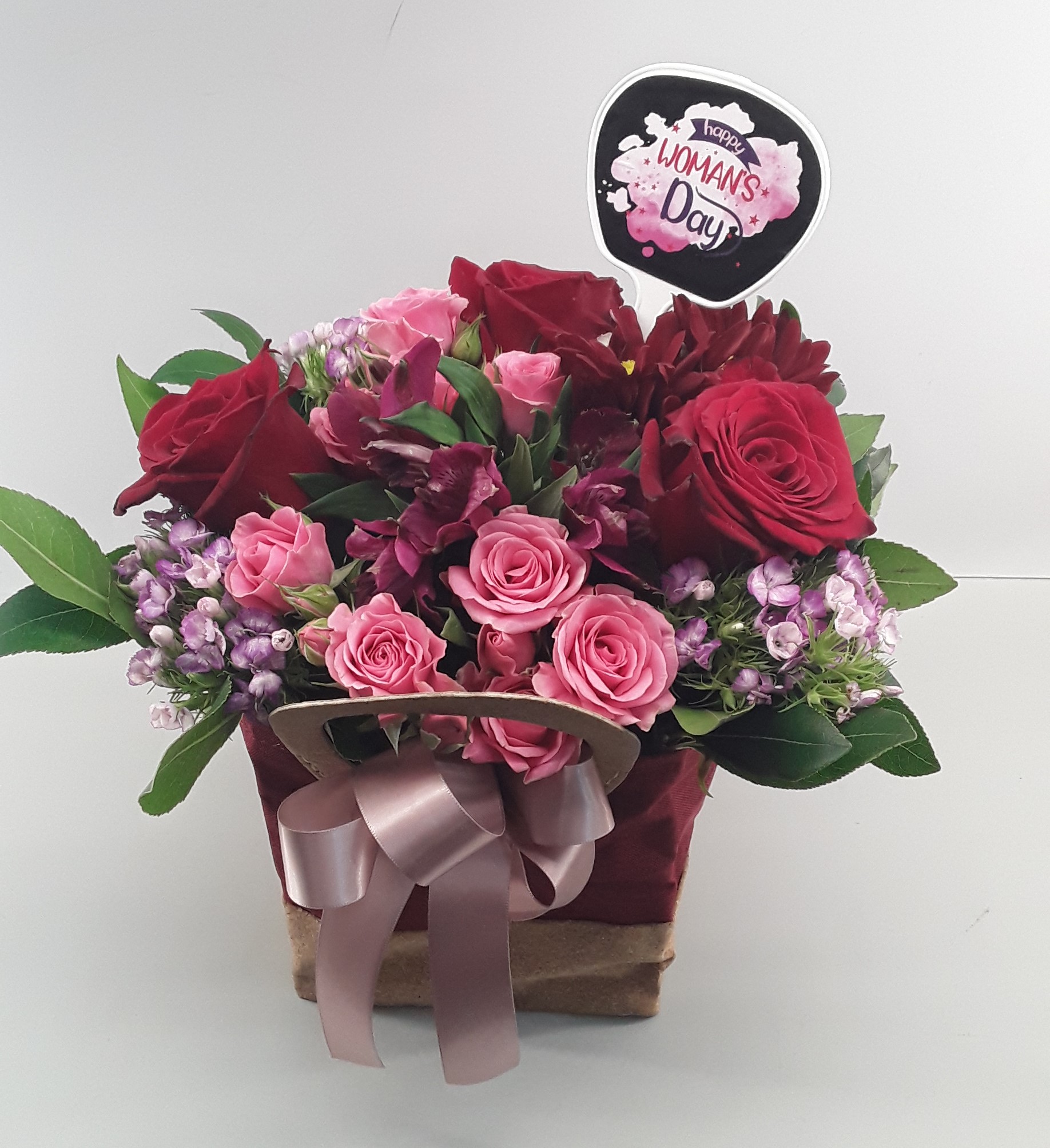 W2422--Mixed flowers in red bag