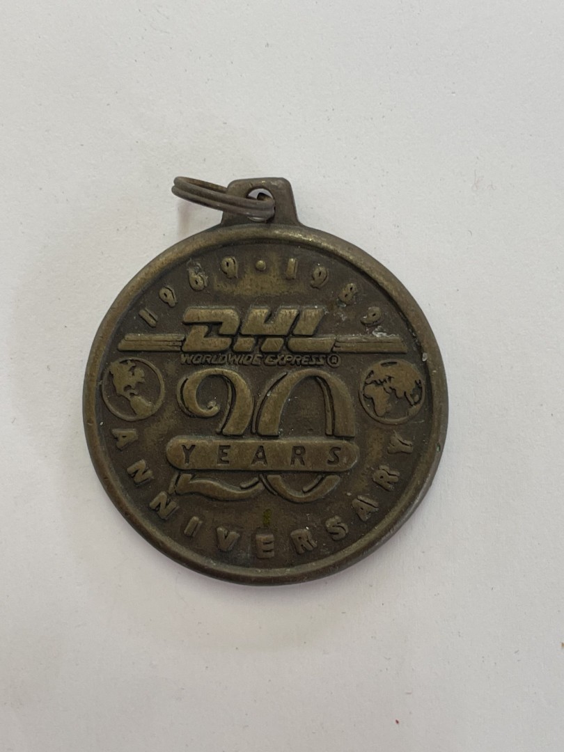 Celebrating 20 Years: Dhl Metal Commemorative Piece (1969-1989) 0.03Kg 4Cmx4Cm (Wxlxh)