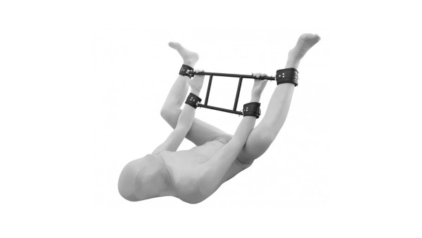 Ankle and wrist metal and leather restraint system