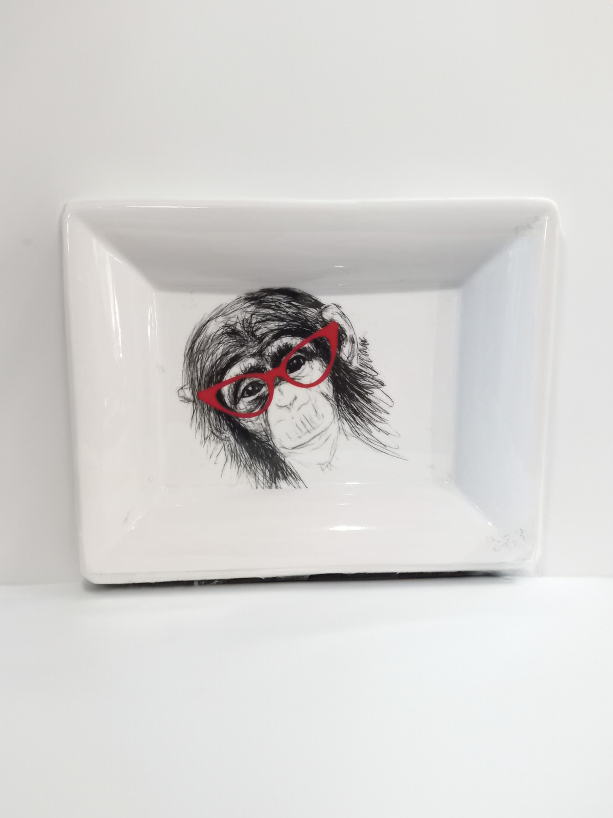 Porcelain monkey ashtray colour red size 20x16