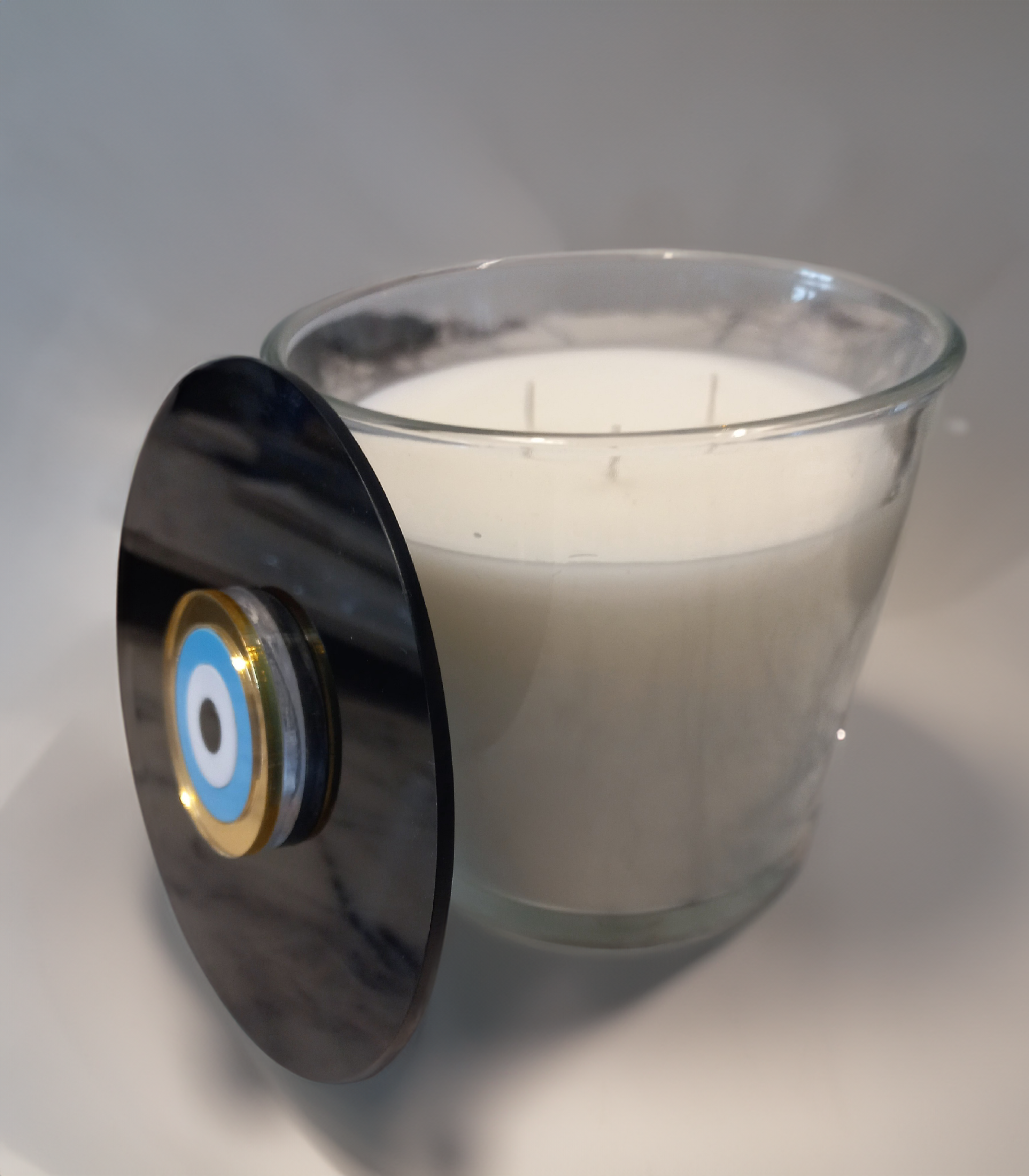 Candle clear eye colour clear black size x-large