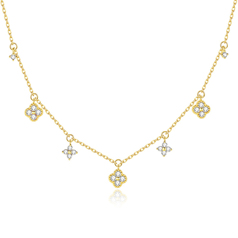 Clover charms in gold