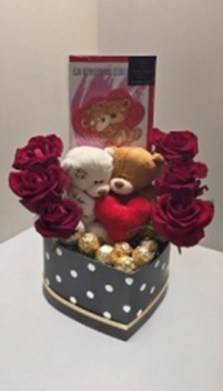 6 First quality red roses ,Family Tedy bears ,6 Ferrero Rocher,1 card in a Heart box