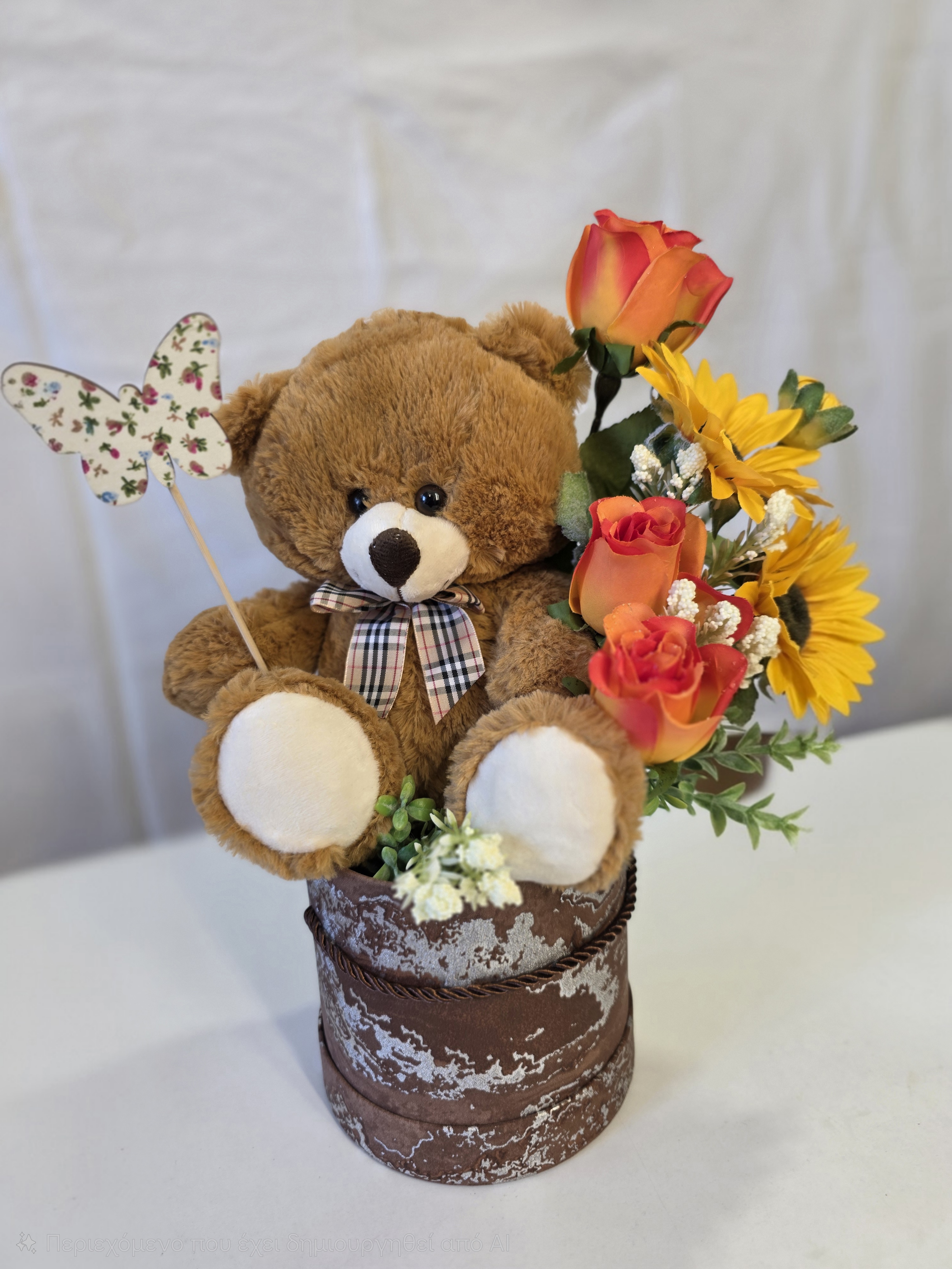 3 roses 2 sunflowers teddy bear in a box