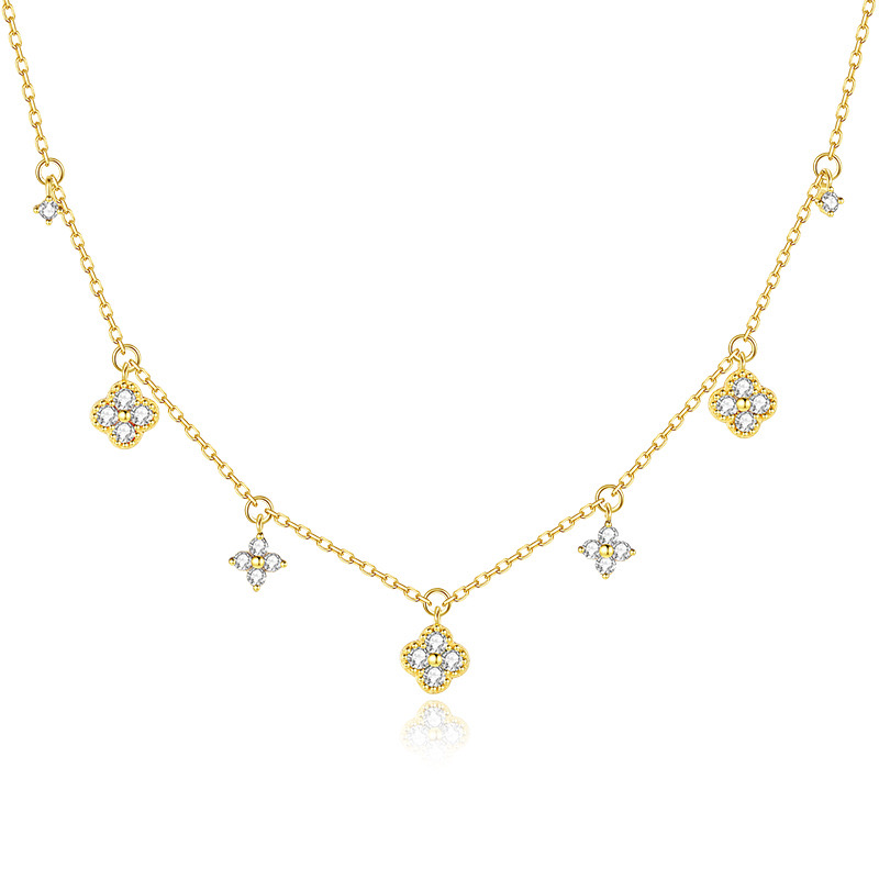 Clover charms in gold