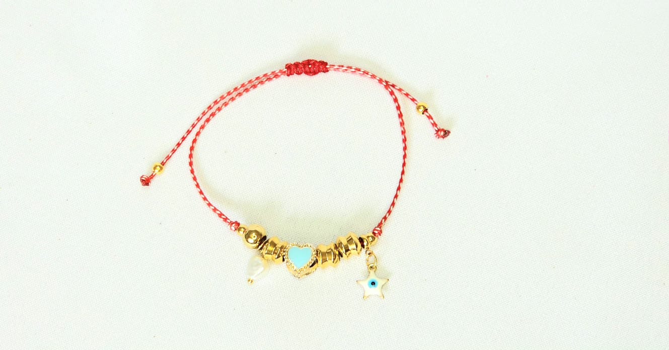 Martaki With Blue Charms, A Hanging Eye Star And A Hanging Pearl.