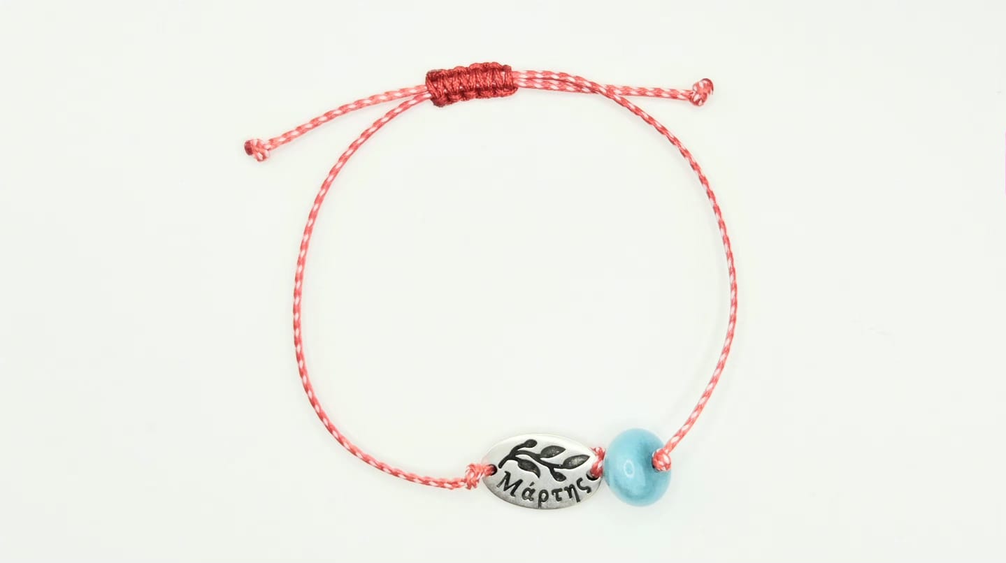 Martaki with silver-red branch and March and  light blue bead.