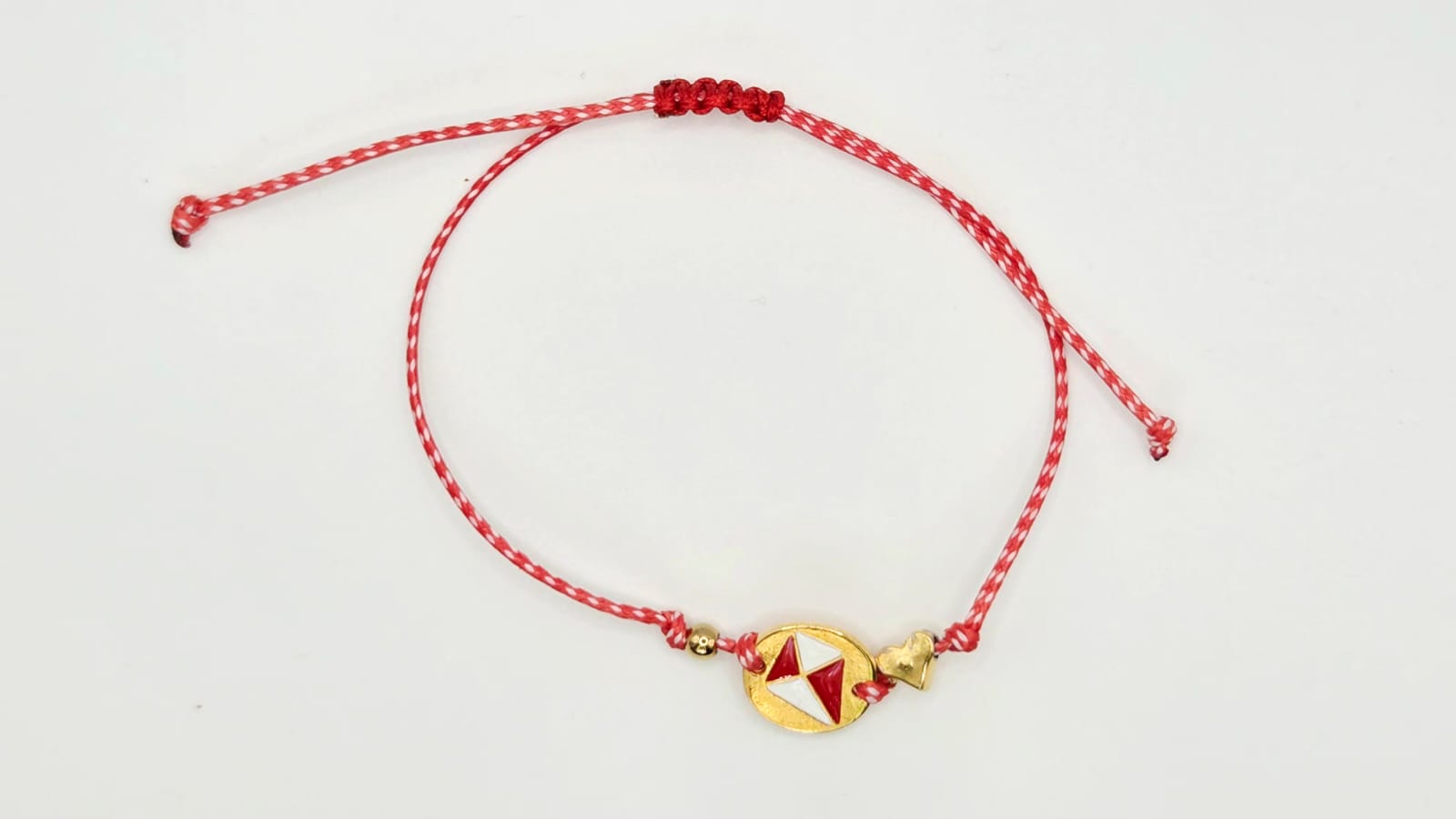 Martaki with kite charm  with red-white enamel and heart.