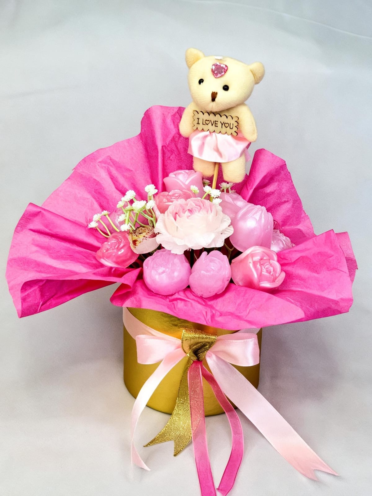 Bouquet of flowers in a gold box. Cod22