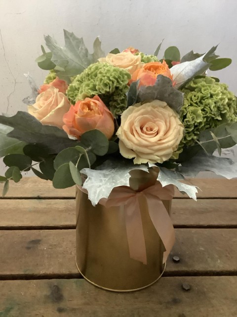 Flower Arrangement with garden roses and mixed greenery