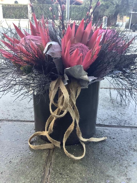 Pink Flowers Arrangement In metalic container