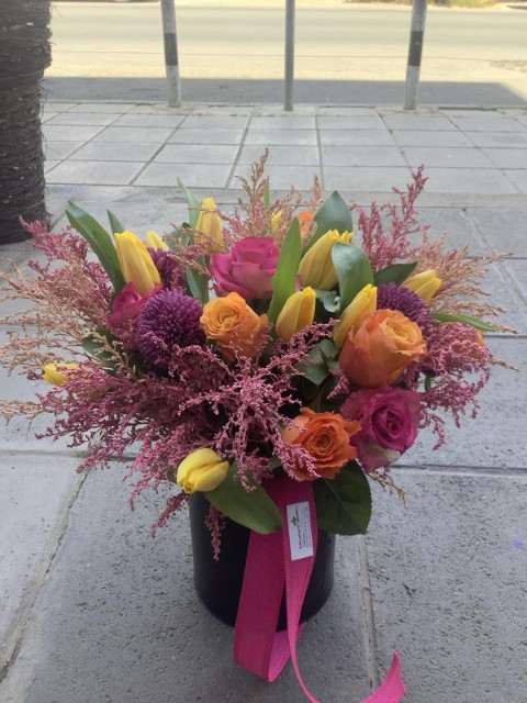 Pink Flowers Arrangement In metalic container