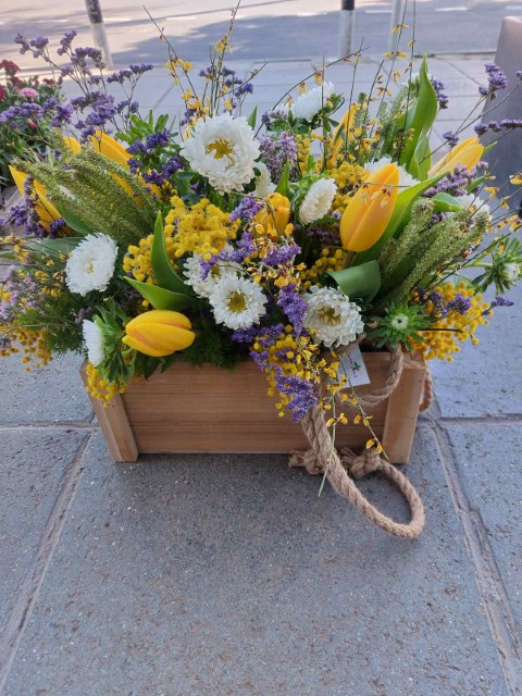 Flower Arrangement In wooden caisson